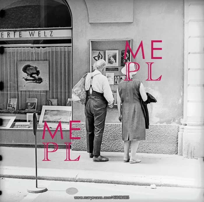 : Passers-by in front of the shop windows of the : Passers-by in front of the shop windows of the
