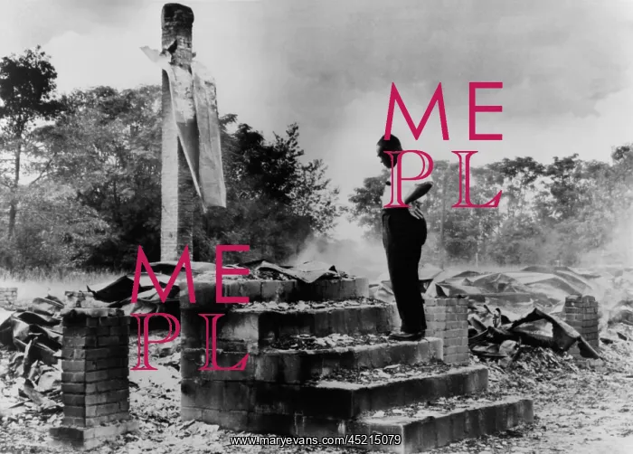 : Pastor H.C. McClain looking over the burned ? : Pastor H.C. McClain looking over the burned ?