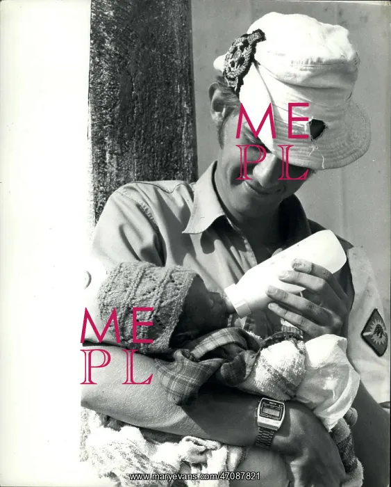 : Paul Newton, medical assistant, gives milk to baby, Rhodesia : Paul Newton, medical assistant, gives milk to baby, Rhodesia