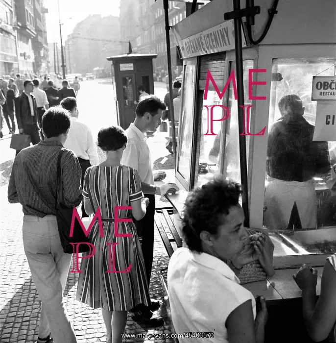: Pedestrians - shadows - cobble stone - phone booth : Pedestrians - shadows - cobble stone - phone booth