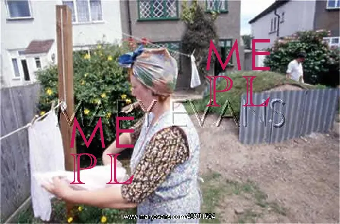 : PEGGING OUT THE WASHING : PEGGING OUT THE WASHING