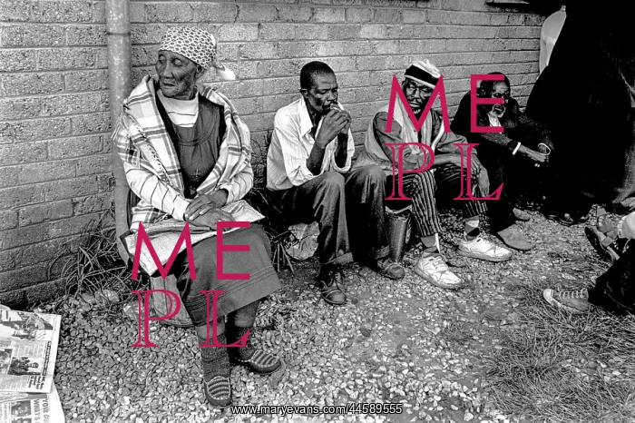 : Pensioners waiting in a queue : Pensioners waiting in a queue