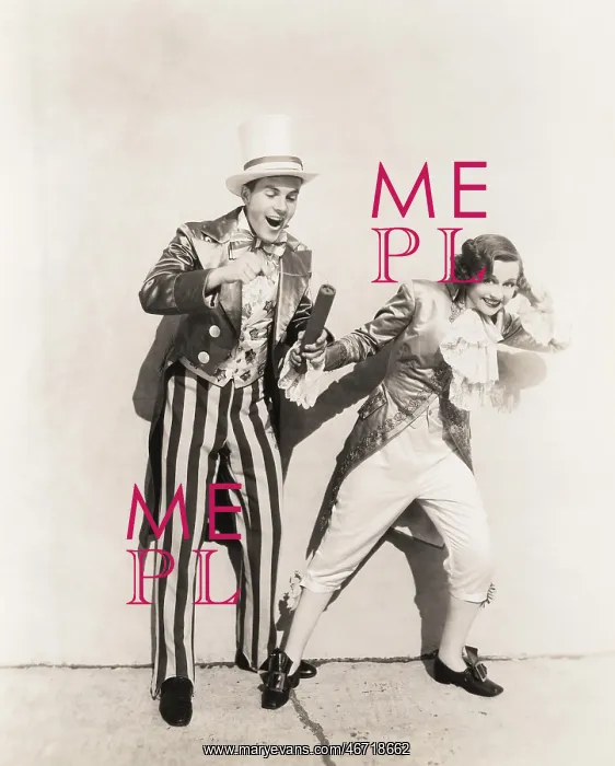 : Two people in 18th century costumes playing with : Two people in 18th century costumes playing with