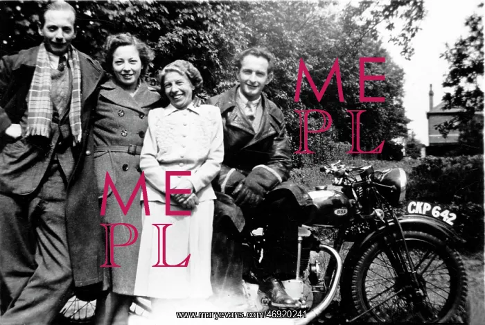 : Four people with a 1936 BSA motorcycle : Four people with a 1936 BSA motorcycle