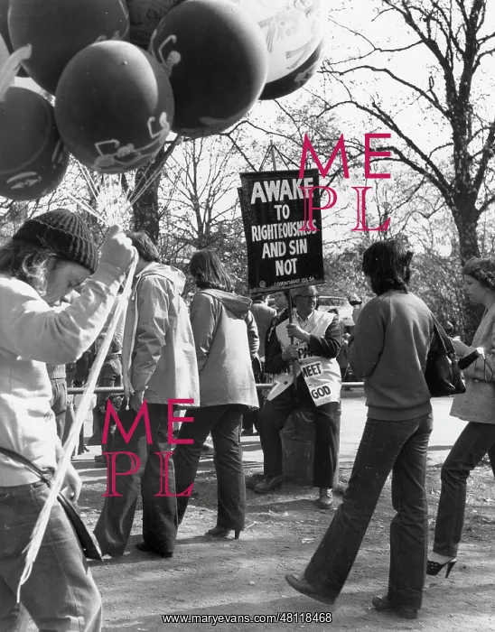 : People with balloons and placards : People with balloons and placards