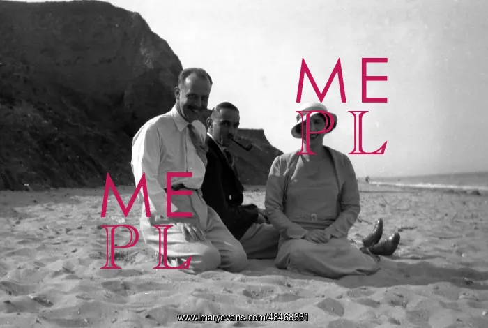  : Three people on a beach