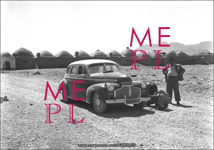 : Two people and their car in Iran : Two people and their car in Iran