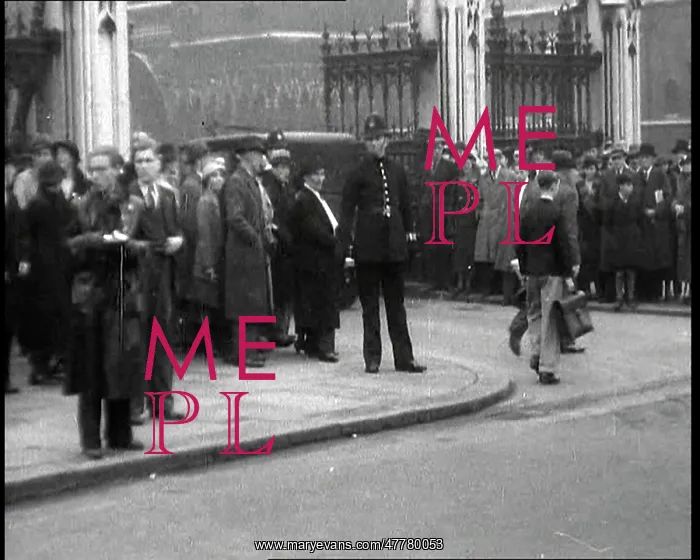 : People Crowding Around Some Gates : People Crowding Around Some Gates