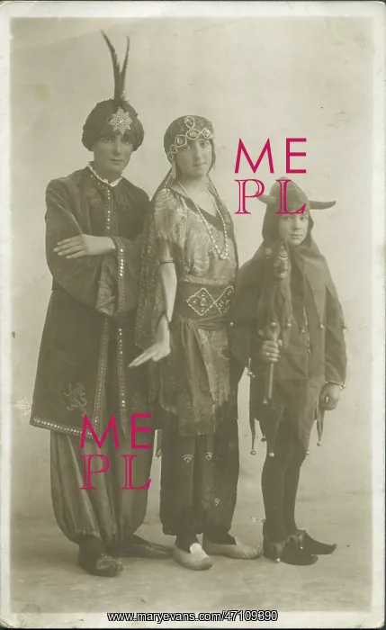 : Three people in fancy dress : Three people in fancy dress