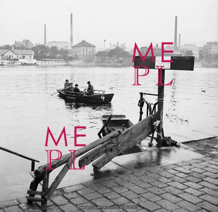  : People being ferried across Vltava River between