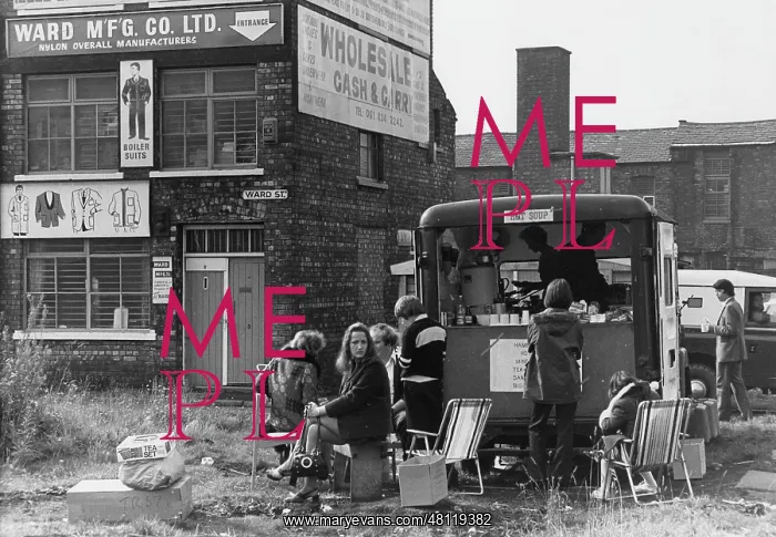 : People gathered round a catering van : People gathered round a catering van