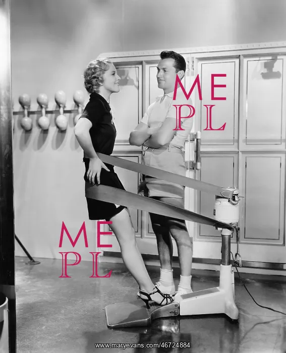 : Two people together in a gym : Two people together in a gym