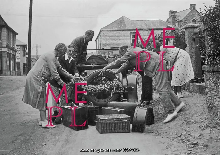 : People loading a car at Perranporth, Cornwall : People loading a car at Perranporth, Cornwall
