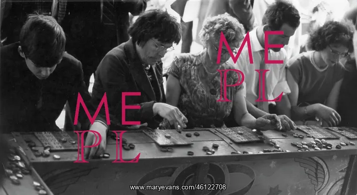 : People play bingo at a fairground stall : People play bingo at a fairground stall