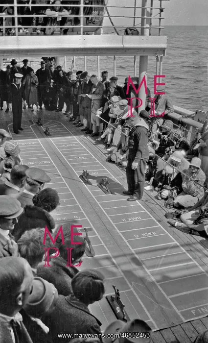 : People on ship's deck playing a game : People on ship's deck playing a game