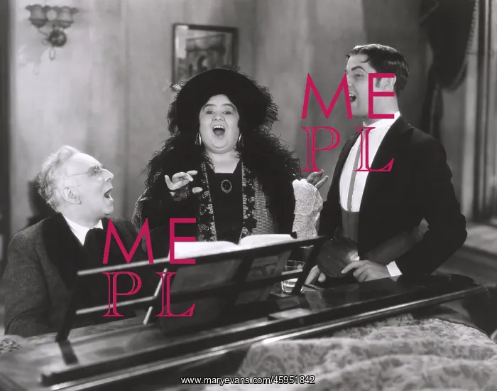 : People singing at piano : People singing at piano