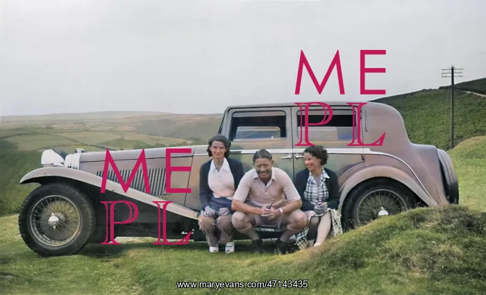 : Three people sitting on running board of car : Three people sitting on running board of car