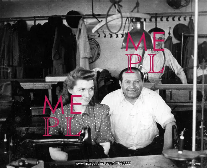  : Three people in a tailors workshop