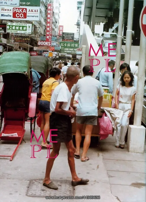 : People walking in different directions on crowded street, Ho : People walking in different directions on crowded street, Ho