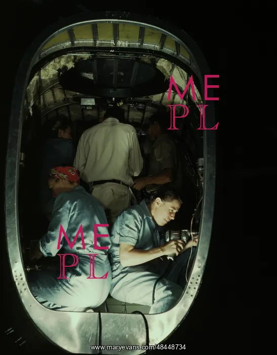 : People working inside fuselage of a Liberator Bomber, 1942 : People working inside fuselage of a Liberator Bomber, 1942