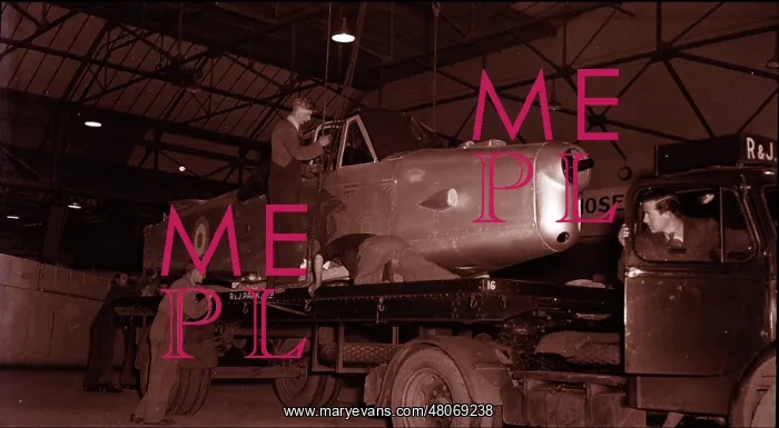 : Percival Prentice being loaded on to the back of a lorry : Percival Prentice being loaded on to the back of a lorry