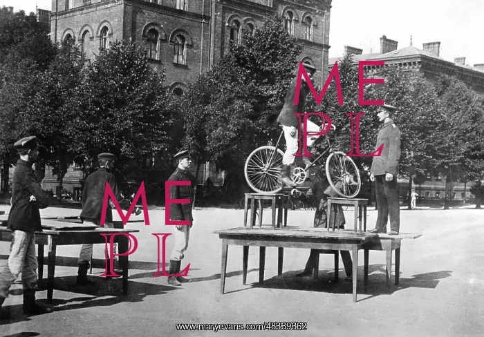 : Performance of cadets on a bike, around 1900 : Performance of cadets on a bike, around 1900