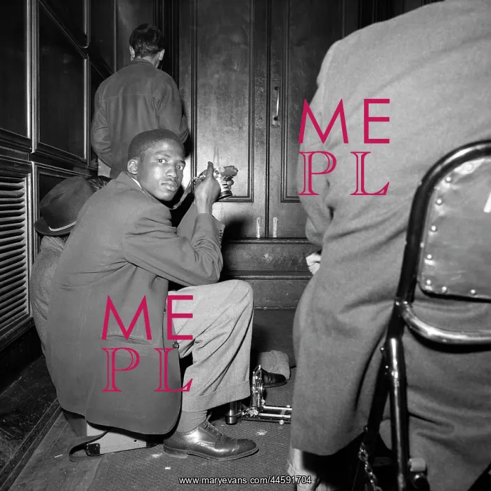 : Peter Magubane sitting and facing the camera : Peter Magubane sitting and facing the camera