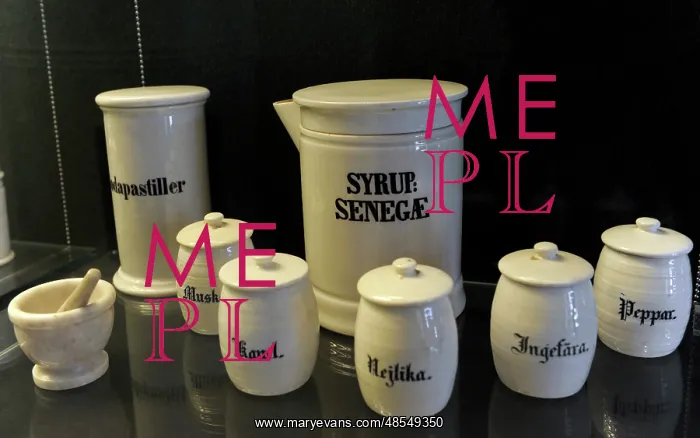 : Pharmaceutical containers with inscriptions, and mortar. pha : Pharmaceutical containers with inscriptions, and mortar. pha