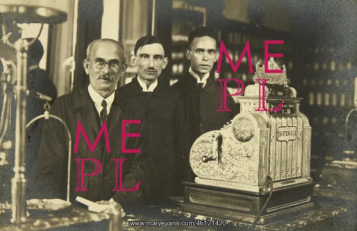 : Pharmacy: three pharmacists next to their : Pharmacy: three pharmacists next to their