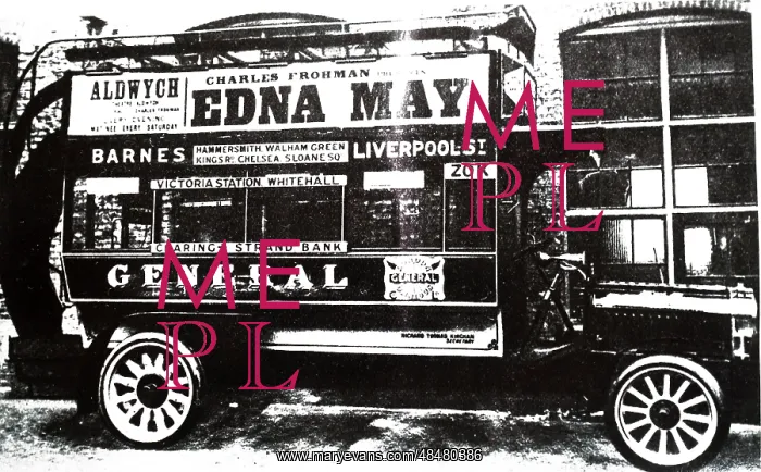 : A photograph of an early motorised bus : A photograph of an early motorised bus