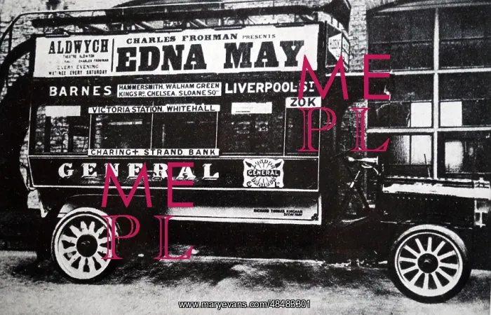 : A photograph of an early motorised bus : A photograph of an early motorised bus