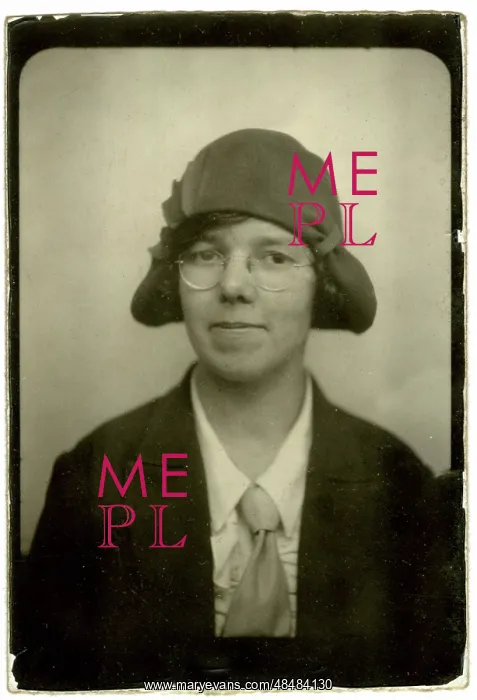 : Photograph of a woman in a hat : Photograph of a woman in a hat