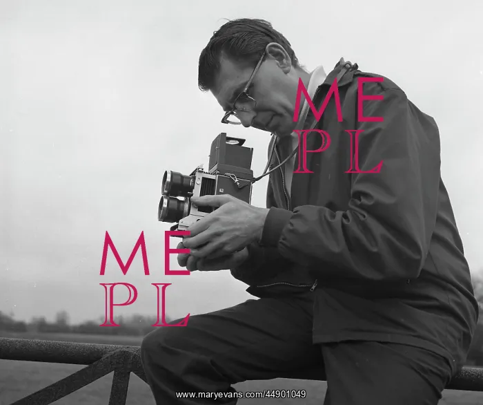 : Photographer with his camera : Photographer with his camera