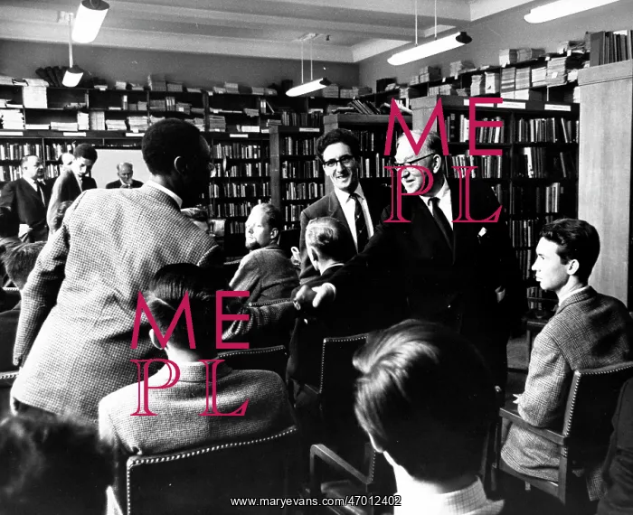 : Physicist John Cockcroft at a meeting in the library : Physicist John Cockcroft at a meeting in the library