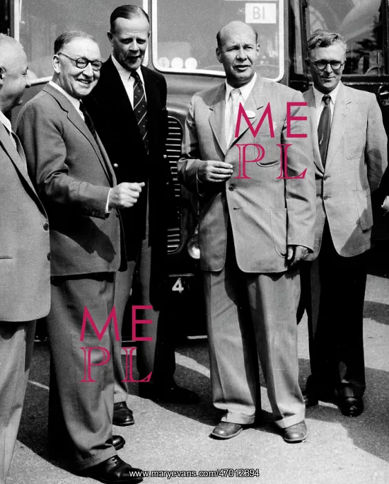 : Physicist John Cockcroft standing with colleagues : Physicist John Cockcroft standing with colleagues