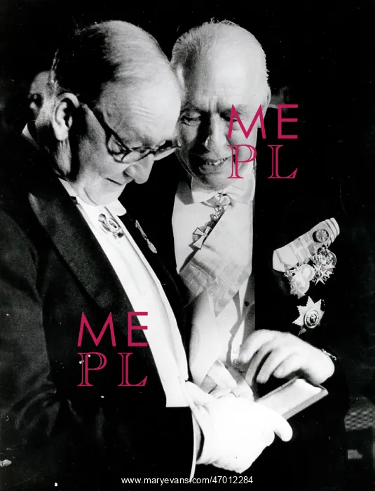  : Physicist John Cockcroft talking with someone