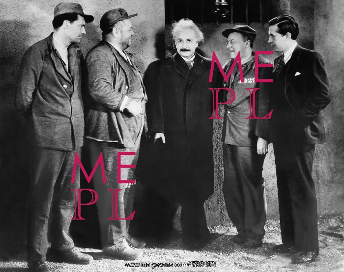 : The physicist and Nobel laureate Albert Einstein stands : The physicist and Nobel laureate Albert Einstein stands