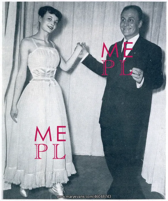 : Pierre Balmain with one of his designs 1948 : Pierre Balmain with one of his designs 1948