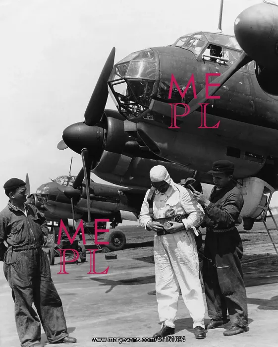 : Pilot prepares for a text Flight, 1941 : Pilot prepares for a text Flight, 1941