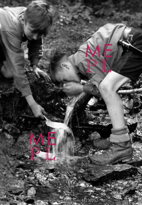: Pimpfe while drinking from a spring, 1935 : Pimpfe while drinking from a spring, 1935
