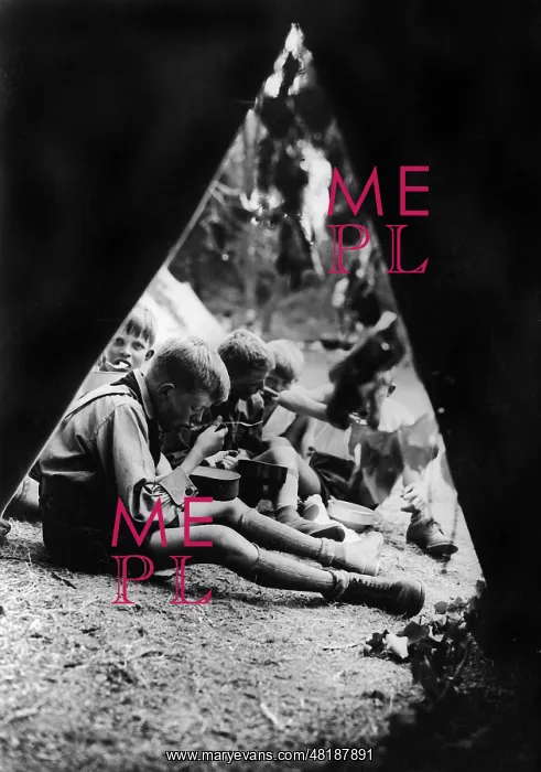 : Pimpfe at the meal in the camp, 1934 : Pimpfe at the meal in the camp, 1934