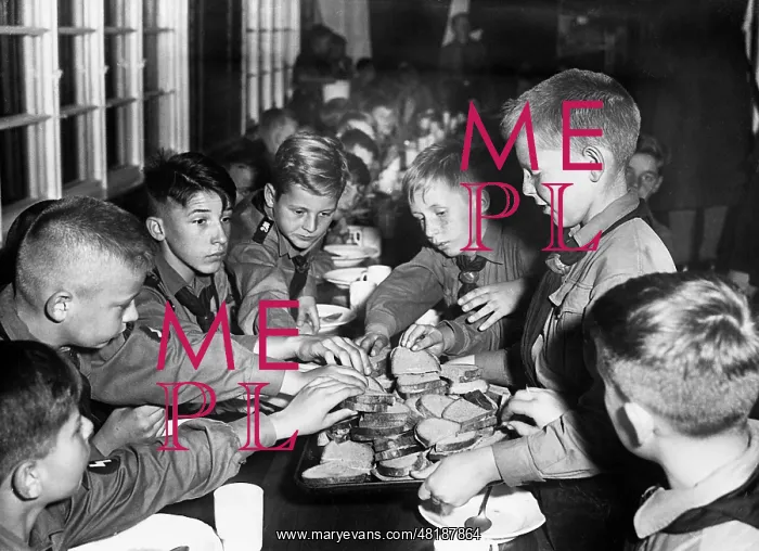 : Pimpfe at the meal in a youth hostel, 1936 : Pimpfe at the meal in a youth hostel, 1936