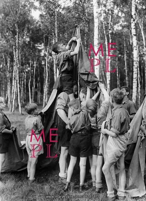 : Pimpfe putting up the tent in a summer camp, 1936 : Pimpfe putting up the tent in a summer camp, 1936