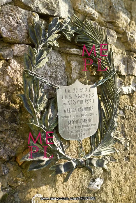 : A plaque in the church just below the memorial : A plaque in the church just below the memorial