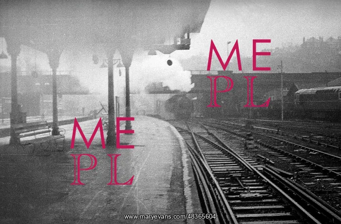: Empty platform with steam train approaching : Empty platform with steam train approaching
