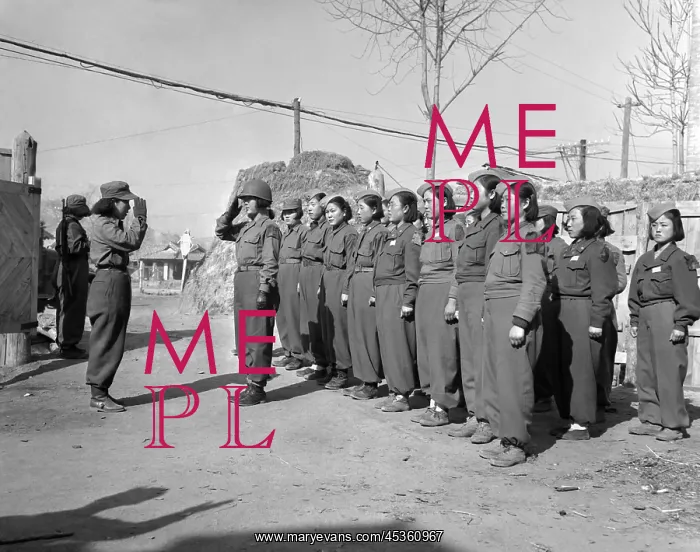 : A platoon of the Korean Women's Army prepares for : A platoon of the Korean Women's Army prepares for