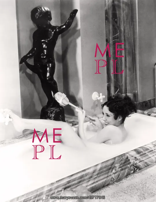 : Playful woman enjoying a bubble bath : Playful woman enjoying a bubble bath