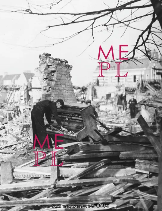 : Playing a piano amid the destruction - The Blitz : Playing a piano amid the destruction - The Blitz