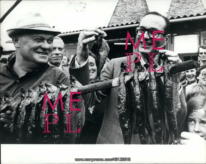 : PM Jacques Chirac with herring in Copenhagen, Denmark : PM Jacques Chirac with herring in Copenhagen, Denmark