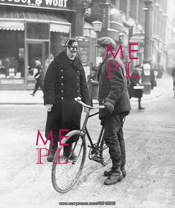 : A police officer instructs a cyclist, 1929 : A police officer instructs a cyclist, 1929
